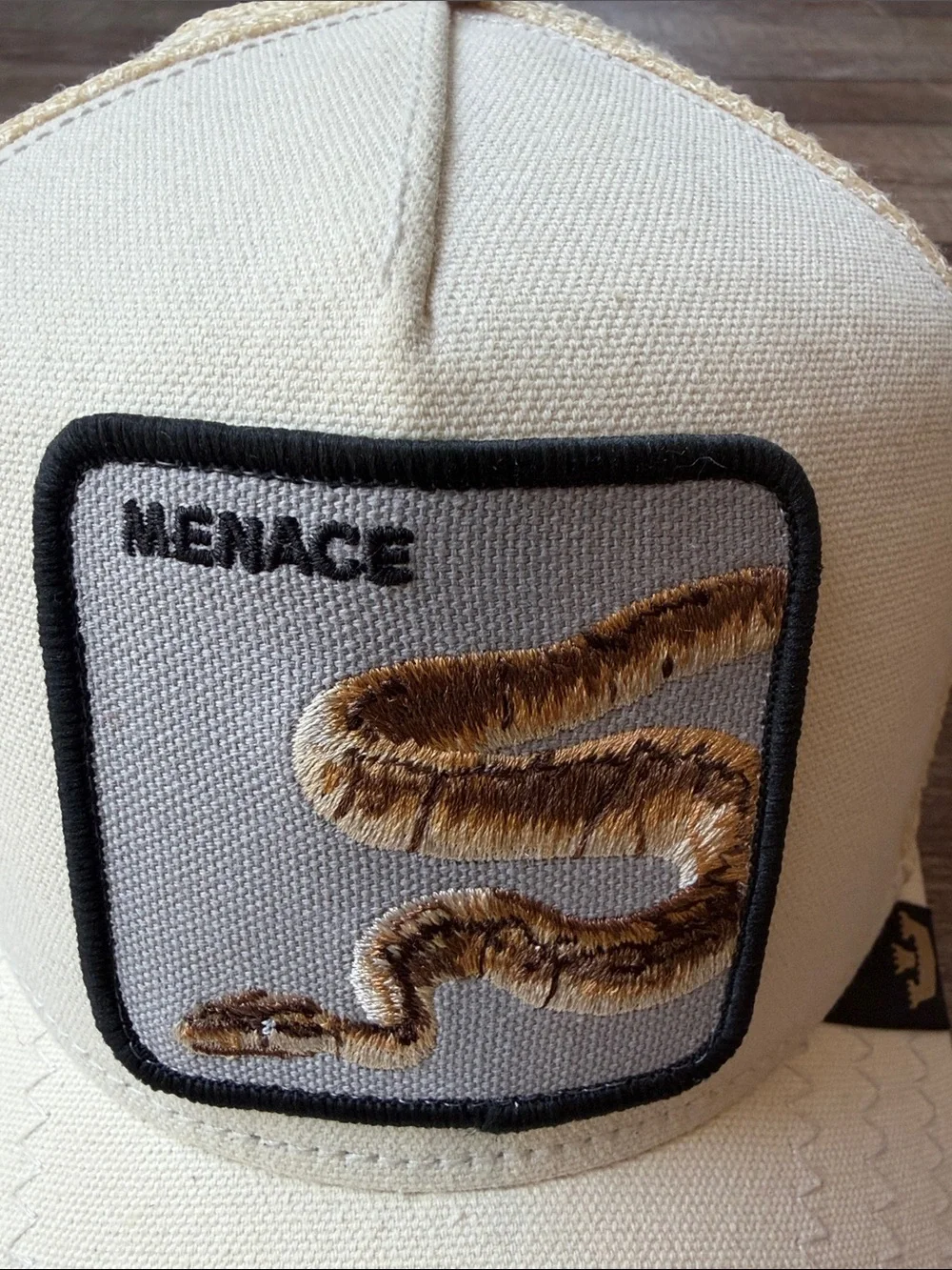 Goorin Bros Cream Trucker Hat with Brown Snake Patch